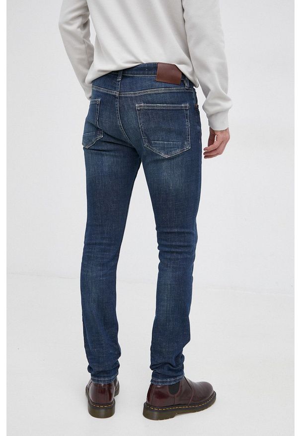 AllSaints - Jeansy Cigarette. Kolor: niebieski