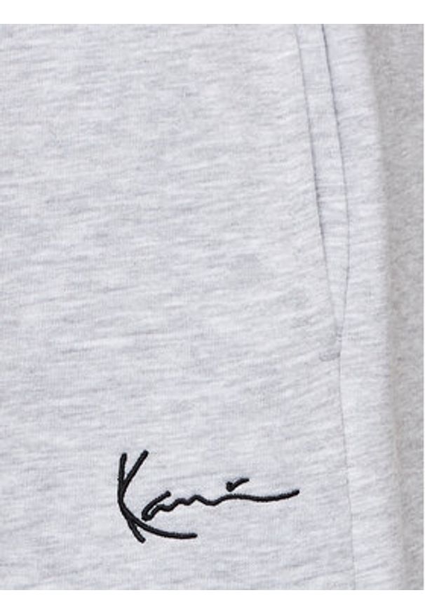 Karl Kani Spodnie dresowe Small Signature Essential 6006899 Szary Regular Fit. Kolor: szary. Materiał: bawełna, syntetyk