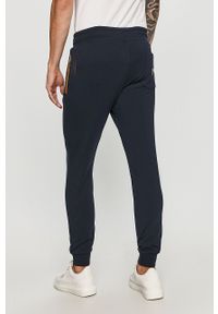 Guess Jeans - Spodnie. Okazja: na co dzień. Kolor: niebieski. Materiał: bawełna, jeans, dzianina, elastan. Wzór: gładki. Styl: casual #3