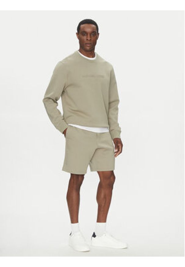 Michael Kors Szorty sportowe CR552G15MF Beżowy Regular Fit. Kolor: beżowy. Materiał: bawełna. Styl: sportowy