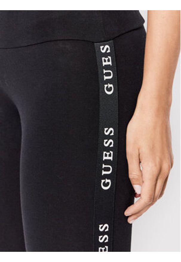 Guess Legginsy V2YB14 KABR0 Czarny Slim Fit. Kolor: czarny. Materiał: bawełna, syntetyk