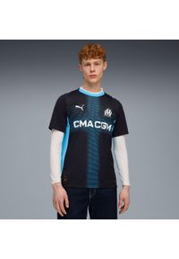 Puma - Koszulka wyjazdowa OM 2025/26. Kolor: niebieski. Sport: piłka nożna