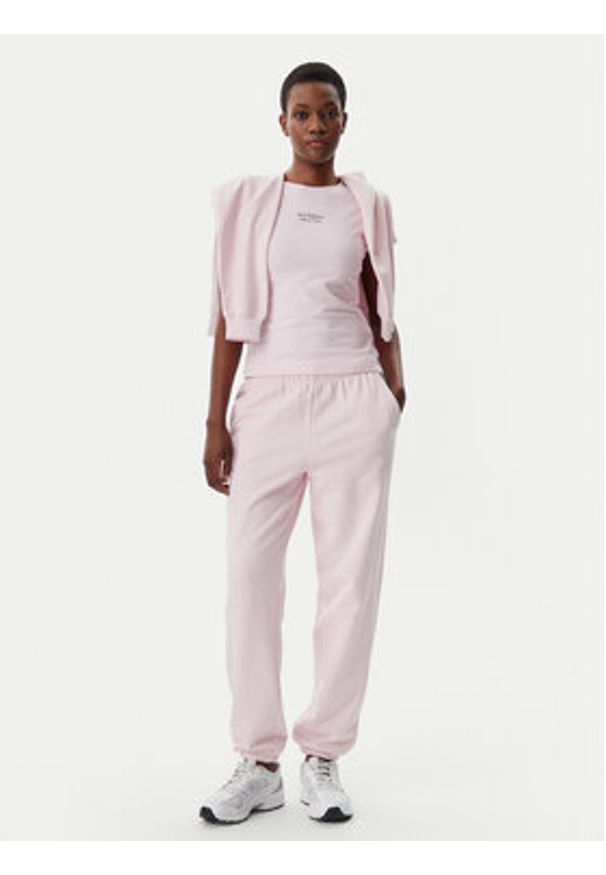 New Balance T-Shirt WT51958 Różowy Slim Fit. Kolor: różowy. Materiał: bawełna