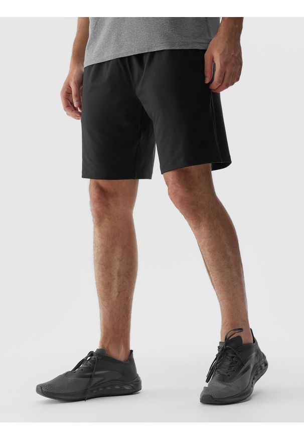 4f - 4F Spodenki treningowe regular szybkoschnące męskie - czarne 3XL. Kolor: czarny. Materiał: elastan, włókno, dzianina, materiał, syntetyk. Długość: krótkie. Wzór: ze splotem, gładki, jednolity. Sport: fitness