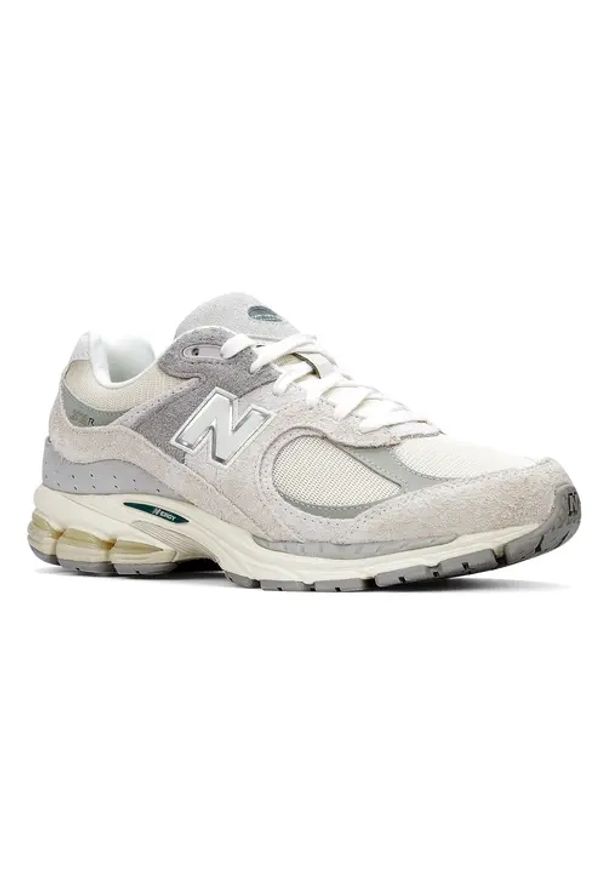 Sneakersy unisex New Balance M2002REK. Okazja: na spacer, na co dzień. Kolor: szary. Materiał: skóra, zamsz. Szerokość cholewki: normalna. Sezon: lato. Sport: turystyka piesza