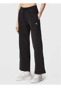 Calvin Klein Jeans Spodnie dresowe J20J220261 Czarny Relaxed Fit. Kolor: czarny. Materiał: bawełna, dresówka #1