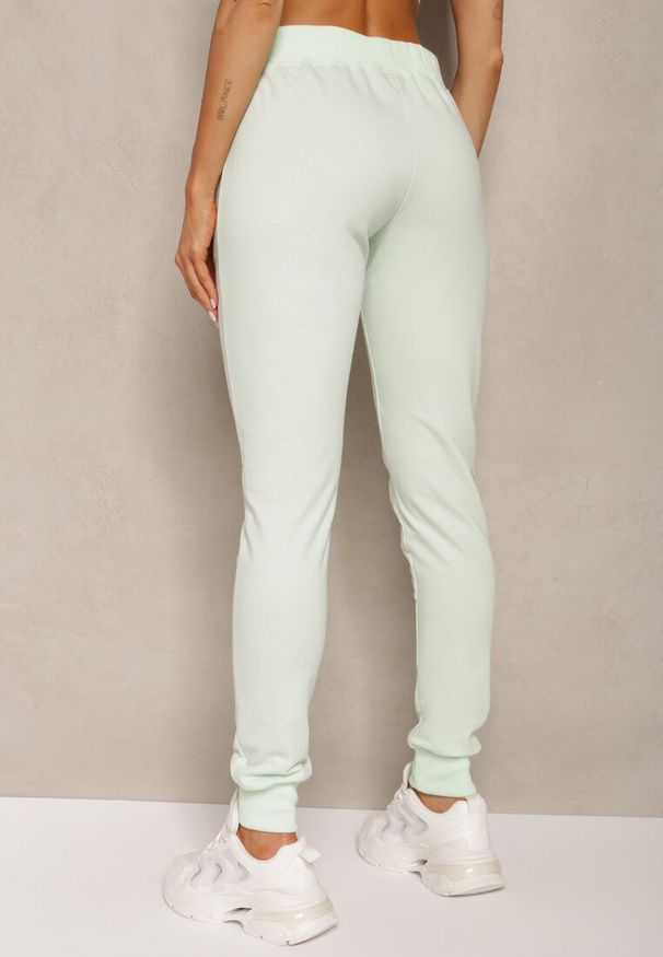Renee - Miętowe Dresowe Spodnie o Klasycznym Fasonie z Gumką w Pasie Ivemia. Okazja: na co dzień, do pracy, na spotkanie biznesowe. Stan: podwyższony. Kolor: miętowy. Materiał: dresówka. Styl: klasyczny