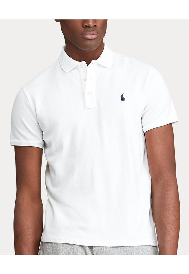 Ralph Lauren - RALPH LAUREN - Biała koszulka z logo Regular Fit. Typ kołnierza: polo. Kolor: biały. Materiał: bawełna, prążkowany. Wzór: haft. Styl: sportowy