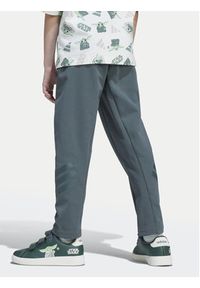 Adidas - adidas Spodnie dresowe Star Wars The Mandalorian™ JF3652 Zielony Regular Fit. Kolor: zielony. Materiał: bawełna. Wzór: motyw z bajki #5