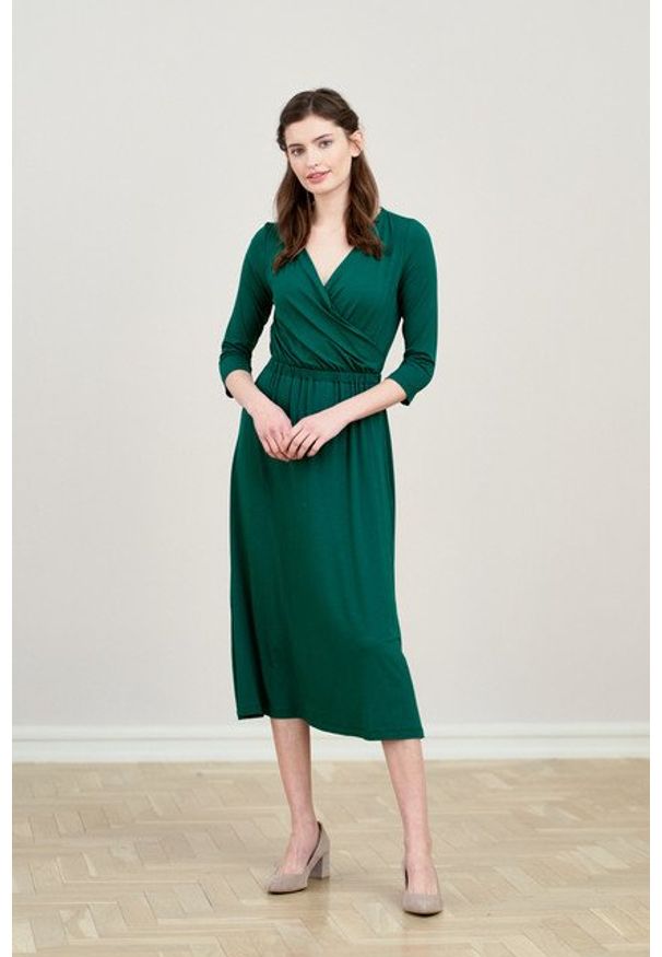 Marie Zélie - Sukienka Rita ciemnozielona. Typ kołnierza: dekolt kopertowy. Kolor: zielony. Materiał: wiskoza, dzianina, materiał, elastan. Długość rękawa: krótki rękaw. Typ sukienki: proste, kopertowe