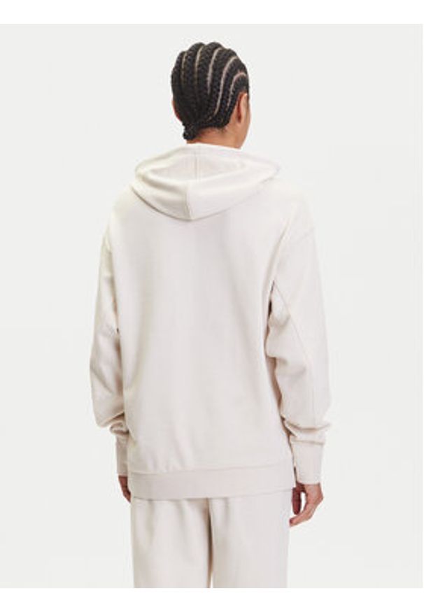 Puma Bluza Her 685057 Beżowy Relaxed Fit. Kolor: beżowy. Materiał: bawełna