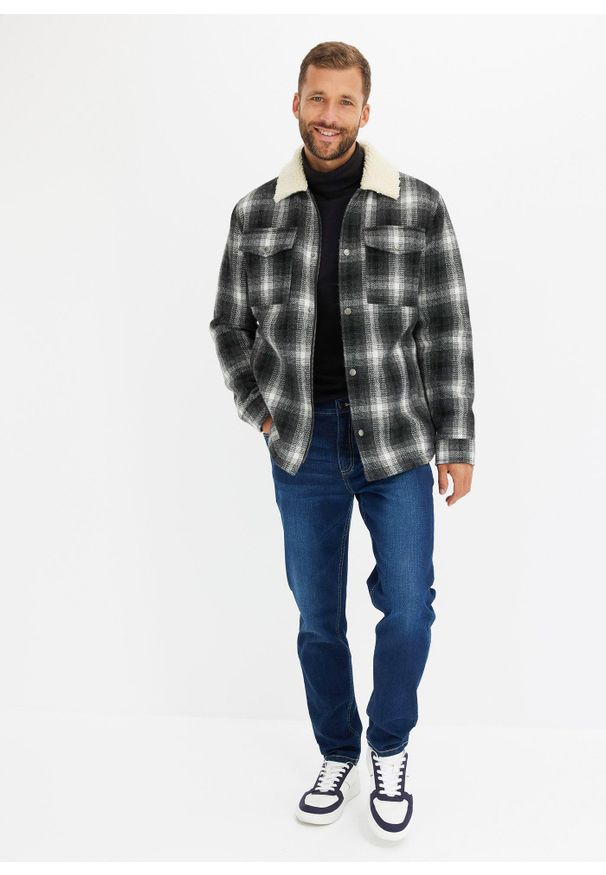 bonprix - Dżinsy ze stretchem Regular Fit Tapered. Kolor: niebieski
