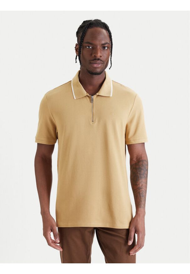 Calvin Klein Polo LV04LF214G Żółty Regular Fit. Typ kołnierza: polo. Kolor: żółty. Materiał: bawełna