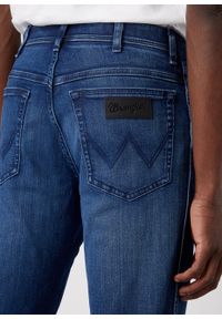 Wrangler - WRANGLER TEXAS SLIM MĘSKIE SPODNIE JEANSOWE APOLLO W12SMN396