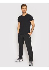 Reebok Spodnie dresowe Training Essentials Woven FP9170 Czarny Regular Fit. Kolor: czarny. Materiał: syntetyk, dresówka #5