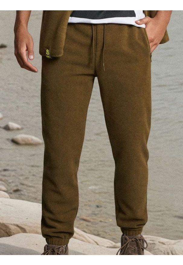 Sinsay - Spodnie jogger - khaki. Kolor: brązowy