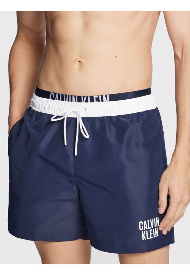 Calvin Klein Swimwear Szorty kąpielowe KM0KM00791 Granatowy Regular Fit. Kolor: niebieski. Materiał: syntetyk