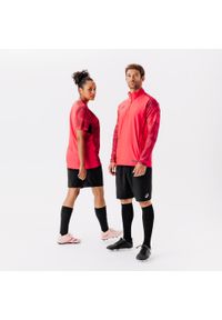 KIPSTA - Bluza piłkarska dla dzieci Kipsta Viralto Wavy Club na krótki suwak. Kolor: czerwony, różowy, wielokolorowy. Materiał: materiał, elastan, poliester. Długość: krótkie. Sport: piłka nożna