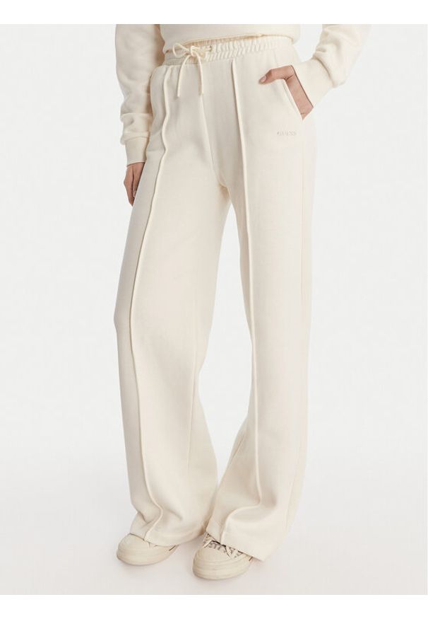 Guess Spodnie dresowe V6RB17 K9V31 Écru Regular Fit. Materiał: bawełna