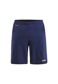 Spodnie treningowe męskie Craft Pro Control Impact. Kolor: niebieski, wielokolorowy, biały. Materiał: syntetyk, materiał. Długość: krótkie. Sport: fitness #1