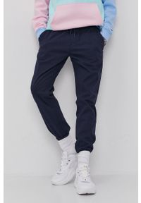Tommy Jeans Spodnie męskie kolor granatowy dopasowane. Kolor: niebieski