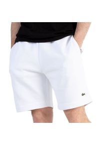 Spodenki Lacoste GH9627-001 - białe. Kolor: biały. Materiał: bawełna, poliester. Długość: do kolan. Sport: fitness