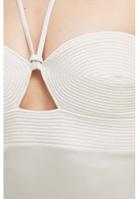 Calvin Klein jednoczęściowy strój kąpielowy kolor beżowy miękka miseczka. Kolor: beżowy. Materiał: materiał, dzianina, poliamid #4