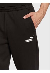 Puma Spodnie dresowe Essentials Logo 586718 Czarny Regular Fit. Kolor: czarny. Materiał: syntetyk, dresówka