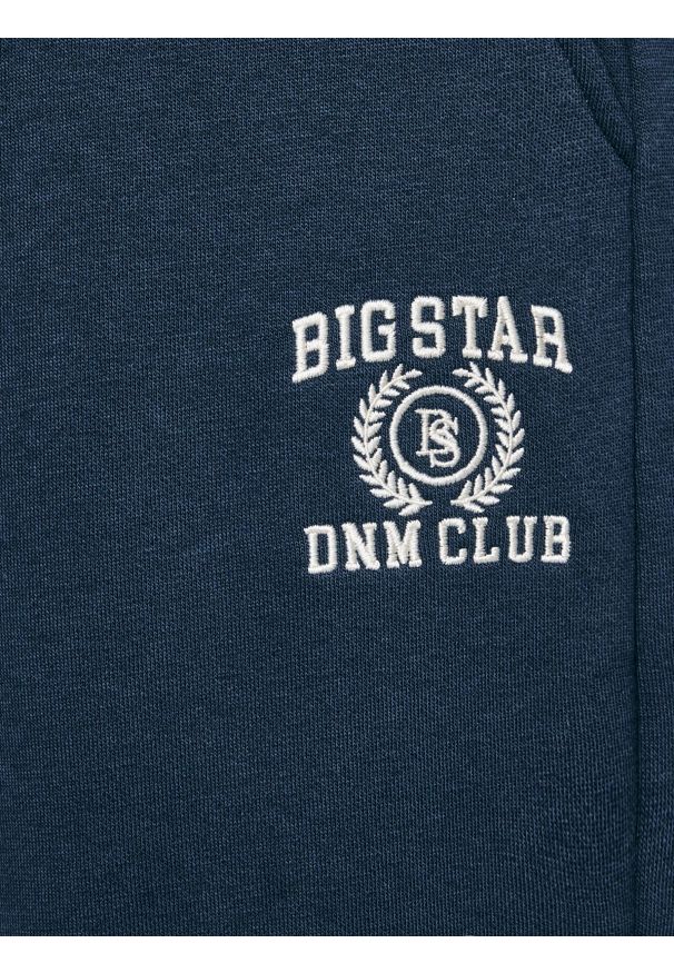 Big-Star - Spodnie damskie dresowe wide granatowe Madelinap 403. Okazja: na uczelnię, na co dzień. Kolor: niebieski. Materiał: dresówka. Wzór: haft. Typ sukienki: sportowe. Styl: elegancki, sportowy, casual