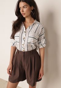 Born2be - Jasnoniebieska Letnia Koszula Oversize z Bawełny w Paski z Nietoperzowymi Rękawami Sheilla. Okazja: na co dzień. Kolor: niebieski. Materiał: bawełna. Wzór: paski. Sezon: lato. Styl: elegancki, casual #1