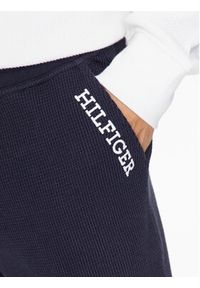 TOMMY HILFIGER - Tommy Hilfiger Spodnie dresowe UM0UM03097 Granatowy Regular Fit. Kolor: niebieski. Materiał: bawełna, dresówka #4