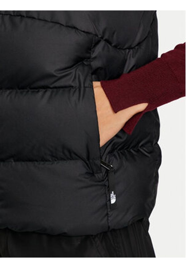 The North Face Bezrękawnik Saikuru NF0A89JF Czarny Regular Fit. Kolor: czarny. Materiał: syntetyk. Długość rękawa: bez rękawów