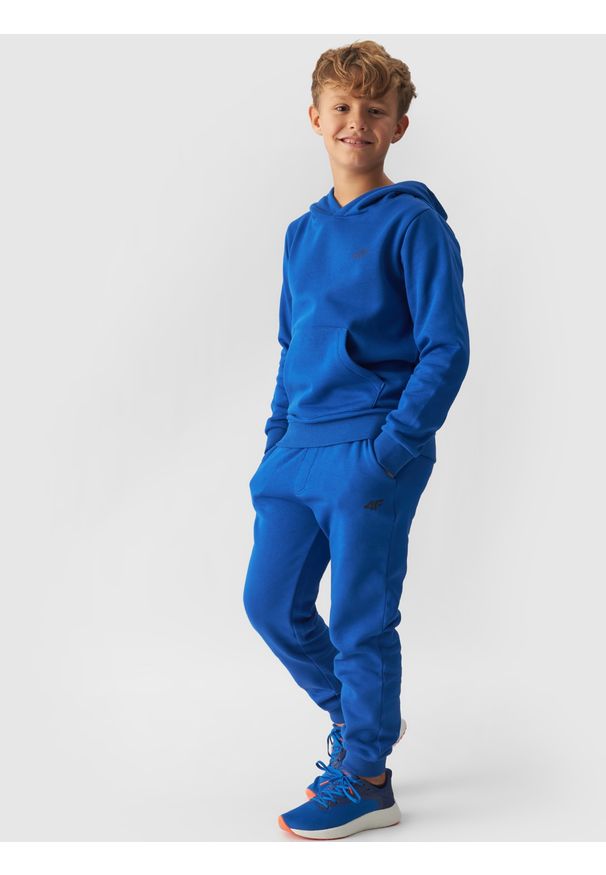 4f - 4F Spodnie dresowe joggery chłopięce - niebieskie 152 (11-12 lat). Okazja: na co dzień. Kolor: niebieski. Materiał: dresówka. Sezon: lato. Styl: casual, sportowy