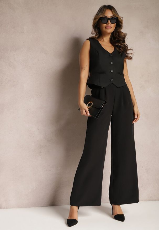 Renee - Czarne Eleganckie Spodnie Dzwony z Ozdobnymi Patkami w Pasie Nattas. Stan: podwyższony. Kolor: czarny. Styl: elegancki