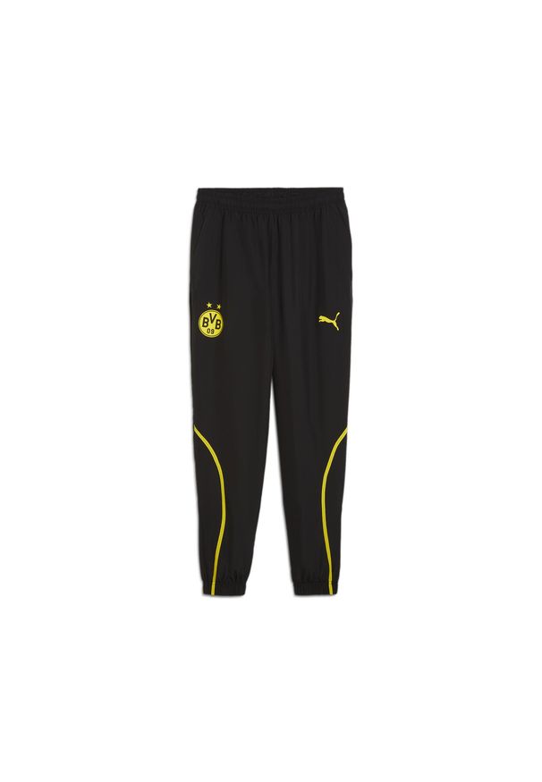 Puma - Męskie spodnie przedmeczowe z tkaniny Borussia Dortmund PUMA Black Faster Yellow. Kolor: czarny, żółty, wielokolorowy. Materiał: tkanina. Sport: piłka nożna