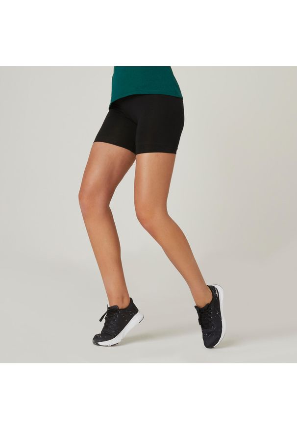 DOMYOS - Spodenki fitness damskie Nyamba Fit+ Slim. Kolor: czarny. Materiał: materiał, elastan, bawełna. Sport: fitness