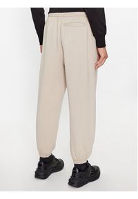 Calvin Klein Jeans Spodnie dresowe J30J322925 Écru Relaxed Fit. Materiał: bawełna