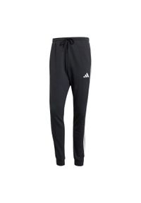 Adidas - Spodnie Essential 3-Stripes French Terry. Kolor: biały, czarny, wielokolorowy. Materiał: materiał