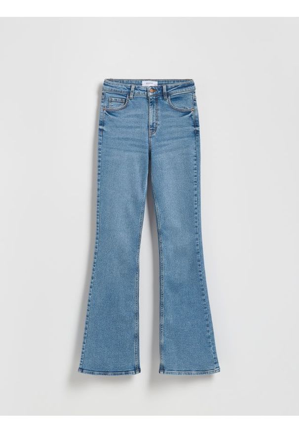 Reserved - Jeansy flare bootcut - niebieski. Kolor: niebieski