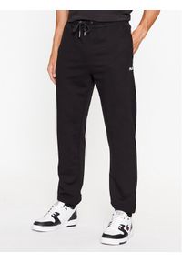 Fila Spodnie dresowe FAM0342 Czarny Regular Fit. Kolor: czarny. Materiał: bawełna, dresówka #1