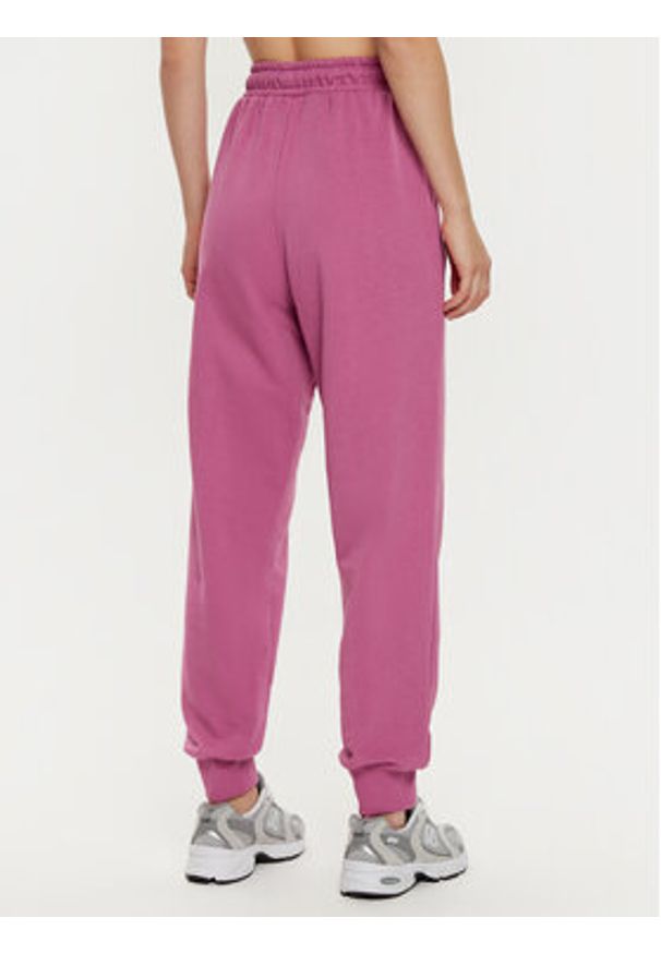 Fila Spodnie dresowe Buetzow FAW0701 Różowy Regular Fit. Kolor: różowy. Materiał: bawełna