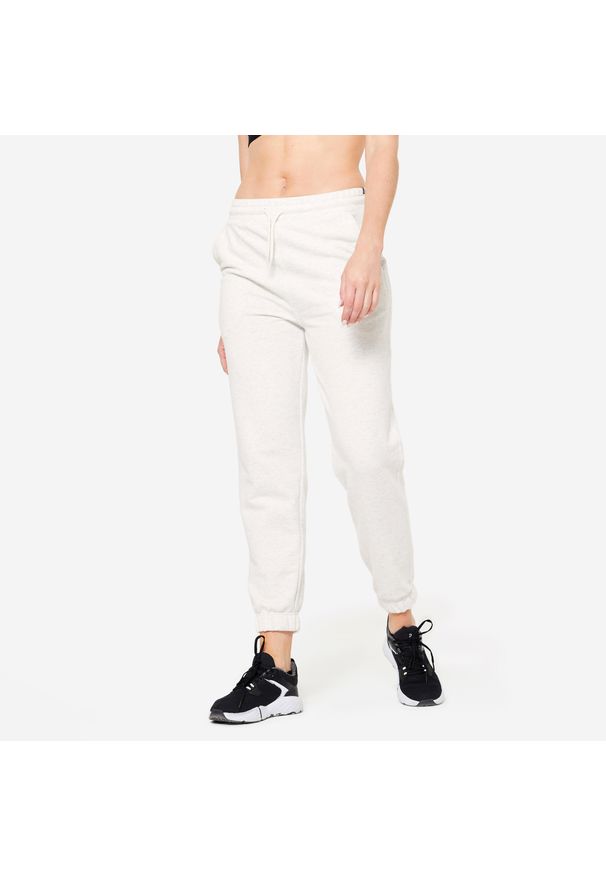 DOMYOS - Spodnie dresowe damskie Domyos Gym & Pilates. Kolor: biały. Materiał: poliester, bawełna, materiał, elastan. Wzór: ze splotem. Sport: joga i pilates