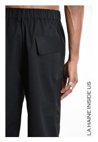 La Haine Inside Us Spodnie | 3Z M1203 | Mężczyzna | Czarny. Kolor: czarny. Materiał: bawełna, poliester. Długość: długie. Wzór: moro, aplikacja. Styl: militarny #5
