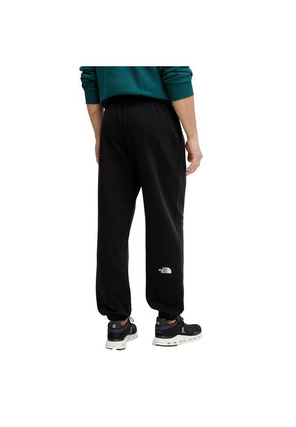 The North Face - Spodnie sportowe męskie North Face Tee. Kolor: czarny