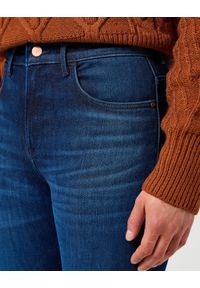 Wrangler - WRANGLER DAMSKIE SPODNIE JEANSOWE HIGH SKINNY SOLSTICE BLUE 112358235 W27H018359