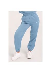 GYM GLAMOUR - Spodnie fitness damskie Gym Glamour dresowe. Kolor: niebieski. Materiał: dresówka. Sport: fitness #1