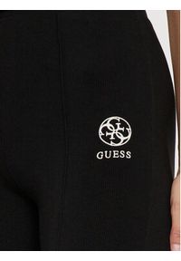 Guess Spodnie materiałowe Elea V4YB01 KCDN0 Czarny Slim Fit. Kolor: czarny. Materiał: wiskoza