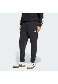 Adidas - adidas Spodnie dresowe Essentials Feel Cozy JE3854 Czarny Regular Fit. Kolor: czarny. Materiał: bawełna #1