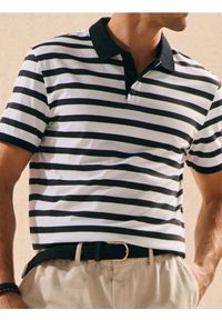 Sinsay - Koszulka polo w paski - czarny. Typ kołnierza: polo. Kolor: czarny. Wzór: paski