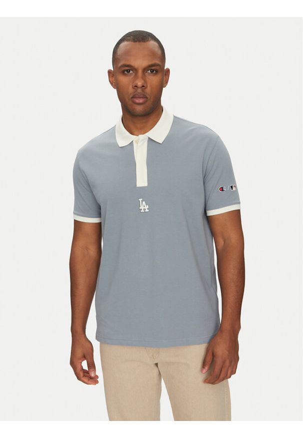 Champion Polo 221044 Niebieski Regular Fit. Typ kołnierza: polo. Kolor: niebieski. Materiał: bawełna